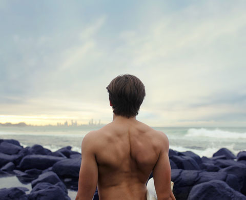 ytoung man at the sea shore